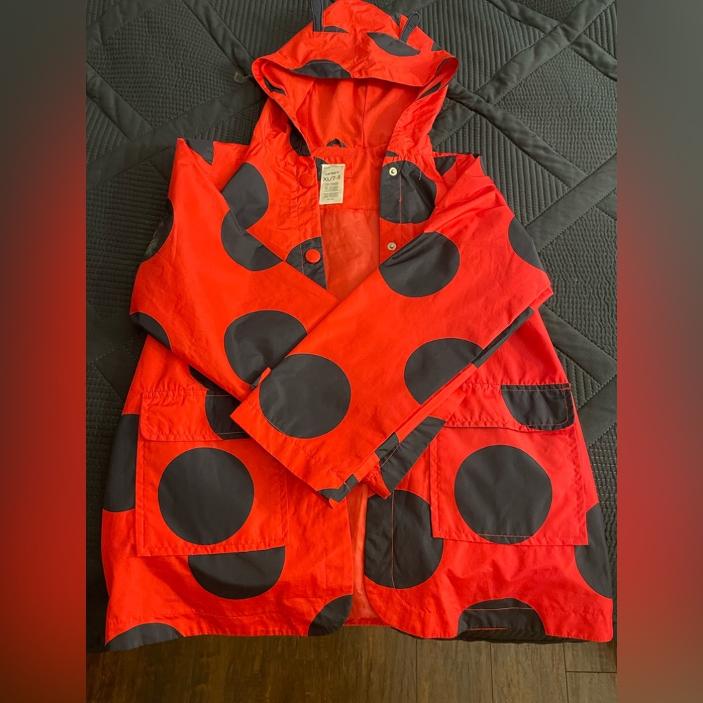 Adorable girls size 7/8 carters raincoat. Ladybug design. Like new, worn once.